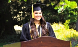 photo of Vanessa Groppetti '21, in cap and gown, taping baccalaureate address