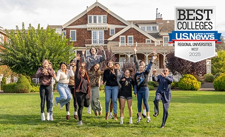 students jumping up in front of meadowlands with the U.S. News badge on the top right corner for Best Regional College West