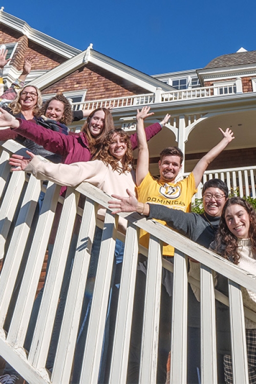 students lined up on staircase cheering. US News 2025 badge