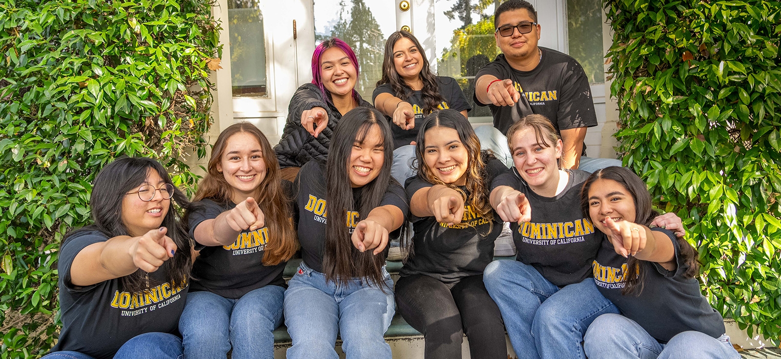 student group pointing at the camera